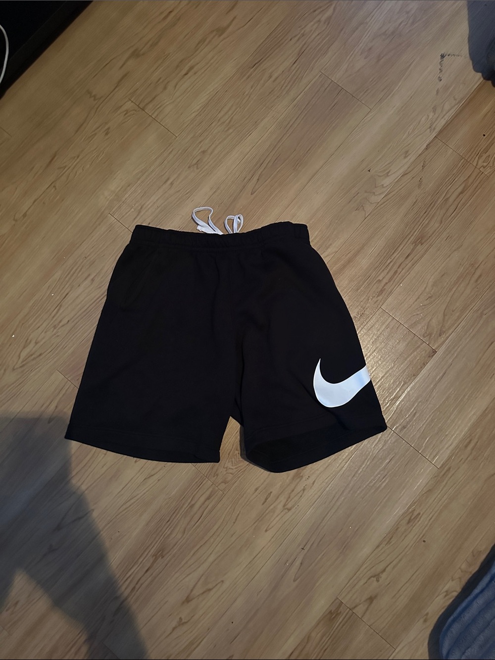 Nike Black Shorts with White Swoosh Accent - Picture 2 of 3